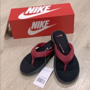 Red Nike flip-flops